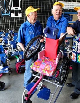 Tom Thompson, Bob Parry and Olly Pickett of 'Wheelchairs for Kids' with one of the wheelchairs headed to Iraq for children who have had limbs blown off during war or by landmines. 
Picture: Simon Santi.
The West Australian. 8th July 2011.
FAIRFAX ONLINE & FIN REVIEW OUT